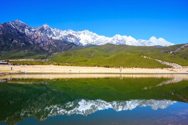 玉湖村，藏在玉龙雪山脚下的世外桃源，被誉为“玉龙山下第一村”